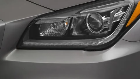 Car headlight close up Iridium Silver Metallic 2020 Genesis G80 3.8 sedan Stock Footage 160099100