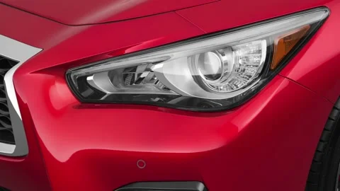 Car headlight close up Lithium Red Pearl 2018 Infiniti Q50 Red Sport 400 Stock Footage 159971607