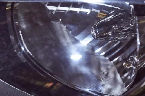 Car headlight close-up. Macro effect photo. Light effects. Stock Photos
