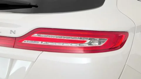 Car headlight close up Magnetic 2017 Lincoln MKC Black Label Stock Footage 159899341