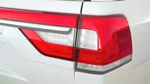 Car headlight close up Magnetic 2017 Lincoln Navigator Select 200A Stock Footage 159899493