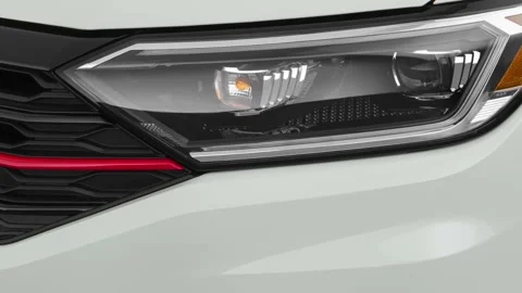 Car headlight close up Molten Silver 2019 Volkswagen Jetta GLI S Stock Footage 160082262