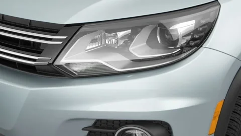 Car headlight close up Moonstone White 2017 Volkswagen Tiguan 2.0T Sport Stock Footage 159937033