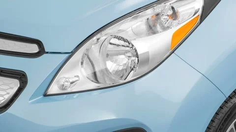 Car headlight close up Mythos Black Metallic 2016 Chevrolet Spark EV 2LT Stock Footage 159872809
