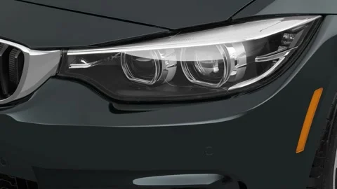 Car headlight close up Navarra Blue Pearl Effect 2018 BMW 4-series 440i Stock Footage 159950771