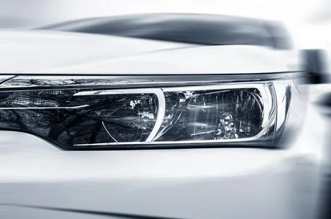 Car headlight close-up. Stock Photos