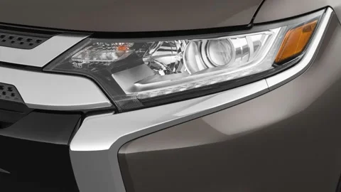 Car headlight close up Phytonic Blue Metallic 2019 Mitsubishi Outlander ES 2.4 Stock Footage 160033375