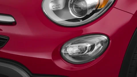 Car headlight close up Summit White 2018 Fiat 500X Trekking Video stock 160004167