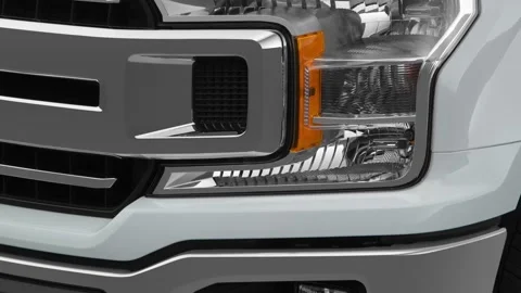 Car headlight close up Ultra Black 2018 Ford F-150 XLT Stock Footage 159965394
