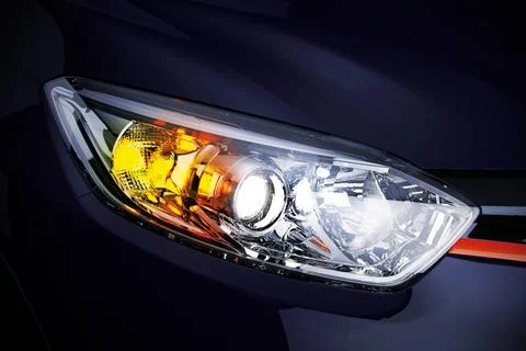 Car headlight with copy space macro view closeup of modern car. Stock Illustration