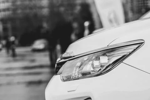 Car headlight in front Stock Photos