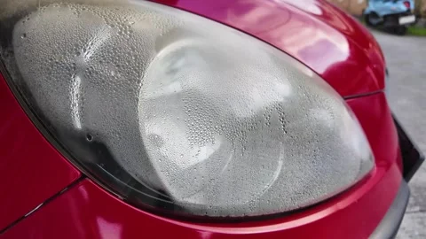 Car Headlight with Interior Condensation Stock Footage 340861015