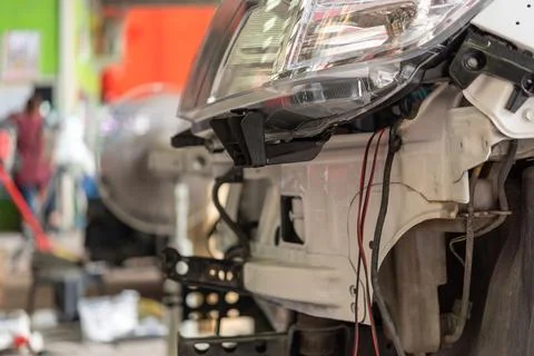 Car Headlight Repair in Auto Workshop Stock Photos