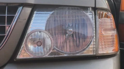 Car Headlight Smashed with Baseball Bat Vandalism Video stock 98424148