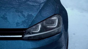 Car headlight in the snow Stock Footage 85928096