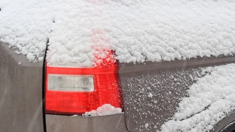 Car headlight in the snow in winter Stock Footage 100300363