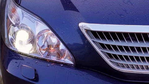 Car headlight washer system in its work Stock Footage 73791328
