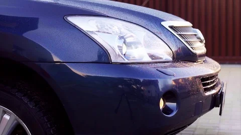 Car headlight washer system in its work Stock Footage 75010569