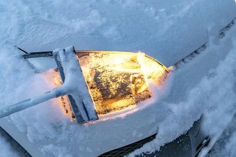 Car headlights covered with snow Stock Photos