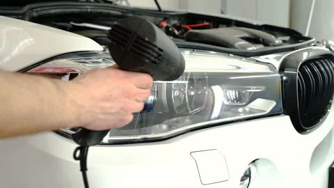 Car headlights polishing process. Video stock 94335340