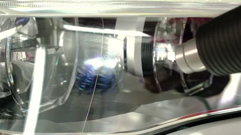 Car headlights polishing process. Video stock 94357578
