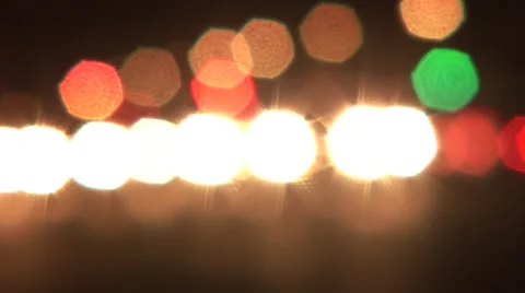 Car headlights rack into focus during rush hour Stock Footage 41253762