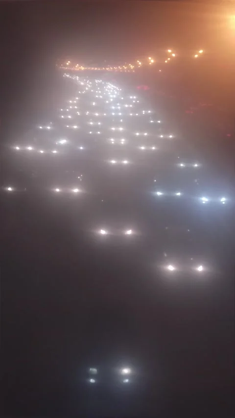 Car headlights through cloudy glass Stock Footage 168289571