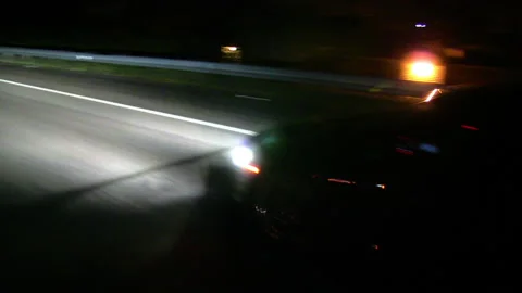 CAR ON HIGHWAY NIGHT Stock Footage 194573203