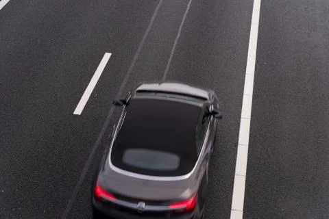 Car on highway passing by Stock Photos