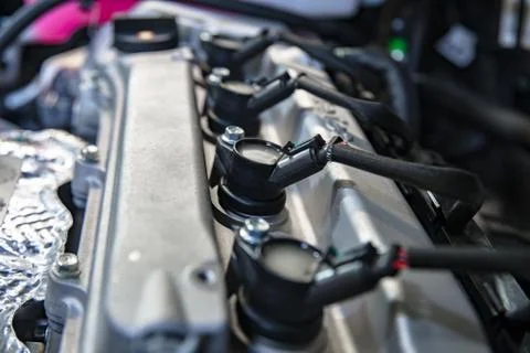 Car ignition coils with shallow depth of field Stock Photos