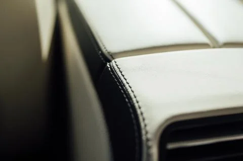 Car inside driver place. Interior of prestige modern car. Front seats with Stock Photos