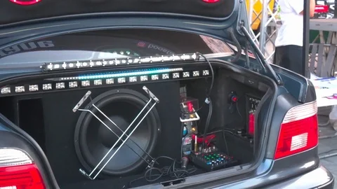 Car with installed powerful subwoofer Stock Footage 115716304