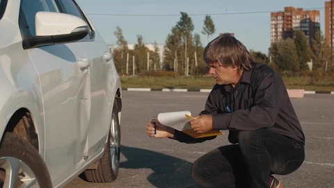 Car insurance agent at work Stock Footage 118366707