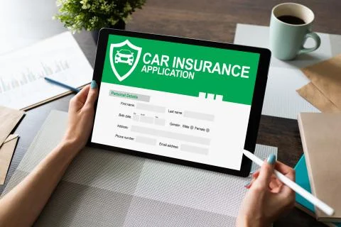 Car insurance application form on screen. Internet and business concept. Stock Photos