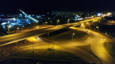 Car interchange ring road night - Aerial footage Stock Footage
