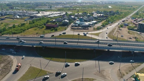 Car interchange ring road traffic - Aerial footage Stock Footage 88592088