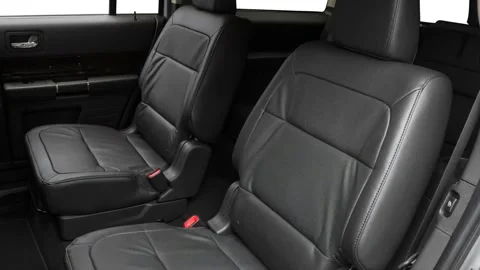 Car interior with back seats and seatbelts  2016 Ford Flex Limited Stock Footage 159895676