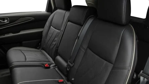 Car interior with back seats and seatbelts  2017 Infiniti QX60 Hybrid AWD Stock Footage 159936348