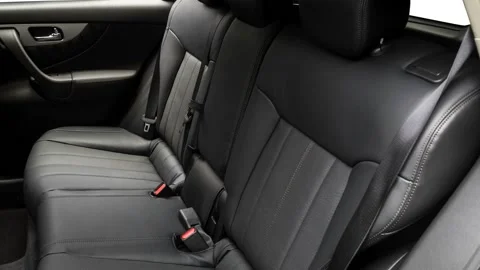 Car interior with back seats and seatbelts  2017 Infiniti QX70 SE Stock Footage 159944714