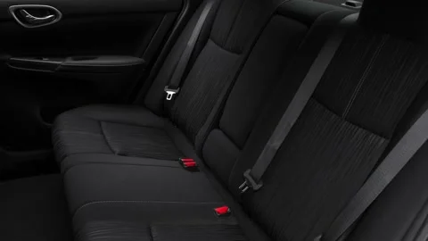 Car interior with back seats and seatbelts  2018 Nissan Sentra SV Stock Footage 159996426