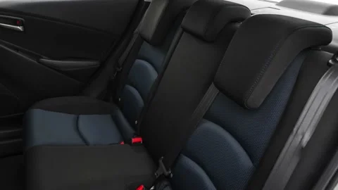 Car interior with back seats and seatbelts  2019 Toyota Yaris LE Stock Footage 160032611
