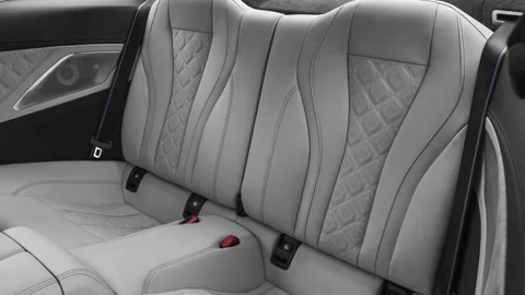 Car interior with back seats and seatbelts  2020 BMW M8 Competition coupe Stock Footage 160098046