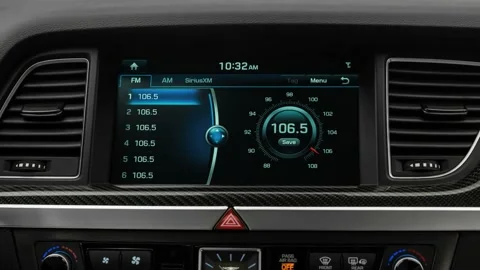Car interior with board and build in radio  2018 Genesis G80 3.3T Sport RWD Stock Footage 159955696