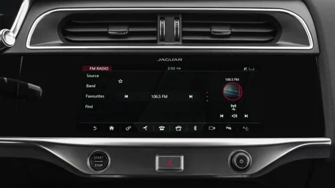 Car interior with board and build in radio  2019 Jaguar I-Pace EV400 HSE Stock Footage 160074751