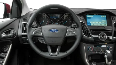 Car interior with board and steering wheel in studio 2016 Ford Focus Titanium Stock Footage 159865956