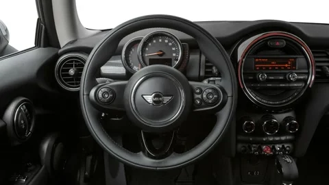 Car interior with board and steering wheel in studio 2016 Mini Hardtop Cooper Stock Footage 159877052
