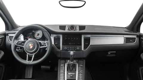 Car interior with board and steering wheel  2017 Porsche Macan GTS Stock Footage 159893552
