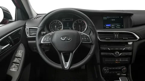 Car interior with board and steering wheel in studio 2017 Infiniti QX30 Stock Footage 159911547