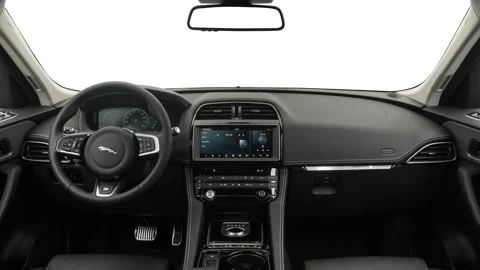 Car interior with board and steering wheel  2017 Jaguar F-Pace 35t R-Sport Stock Footage 159913200