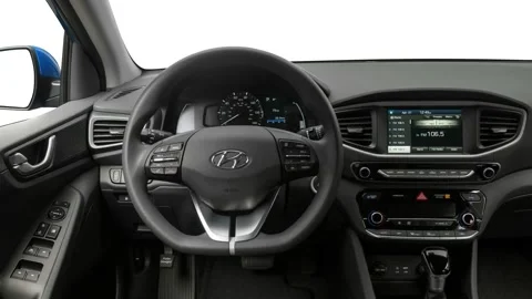 Car interior with board and steering wheel 2017 Hyundai Ioniq Hybrid Blue Stock Footage 159947485